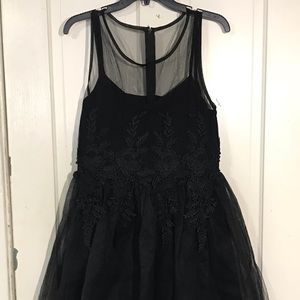 Black dress with beautiful embellishment detail!